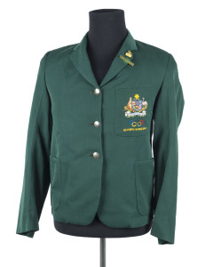PAM KILBORN AT THE TOKYO OLYMPICS: Kilborn's Australian Team Blazer, with Coat-of-Arms & "Olympic Games 1964" embroidered on pocket; her team name badge; her official team lapel badge (kangaroo over Olympic rings) by Stokes; Official Badge with ribbon for Competitor in original case; Participation Medal in wooden box; scrapbook of clippings; books & magazines (8) including "Australia at the Olympic Games 1964"; plus photographs (19) including the official team photo; etc.