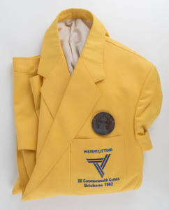1982 COMMONWEALTH GAMES IN BRISBANE: Australian Team Blazer, with "Weightlifting/Commonwealth Games/ Brisbane 1982" embroidered on pocket; plus Brisbane Participation Medal, 57mm diameter. (2 items).