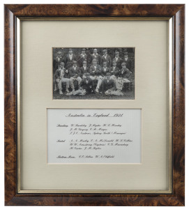 THE AUSTRALIAN TEAM IN ENGLAND - 1921 An original real photo postcard of the Australian Touring Party, signed in pen by all 16 players and officials, attractively mounted together with details of the team. Signatories include Armstrong (Captain), Bardsley, Ryder, Gregory, Mayne, Mailey, Carter & Oldfield. Framed and glazed, overall 33 x 29.5cm.