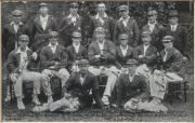 THE AUSTRALIAN TEAM IN ENGLAND - 1921 An original real photo postcard of the Australian Touring Party, signed in pen by all 16 players and officials, attractively mounted together with details of the team. Signatories include Armstrong (Captain), Bardsley - 2