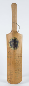 AUSTRALIA in SOUTH AFRICA - 1966 A cut-down Crockett Super Driver bat (45cm long) signed by Australian team including Simpson, McKenzie, Vievers, Lawry, Hawke, Connolly and Booth, as well as eleven South Africans including Goddard, Pollock, Van der Merwe, Barlow and Bland.