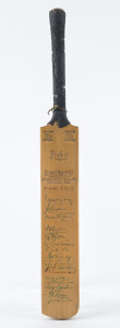 AUSTRALIA v ENGLAND, 1958 - 59 A miniature Stuart Surridge bat signed on the front of the blade by the English Touring party including May, Laker, Bailey, Dexter, Trueman, Statham and Tyson. Also signed by F.R.Brown, Jack Ryder, Bert Oldfield, Gil Langley