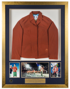 An Australian Olympic Team blazer mounted together with signed photographs of Andrew Gaze (Team Captain and Opening Ceremony Flag Bearer), Rechelle Hawkes (Athlete Oath Taker) and Ian Thorpe (Closing Ceremony Flag Bearer). Limited edition 35/100. With Olympic Committee insignia at lower left. Framed and glazed (acrylic), overall 129 x 97.5cm.