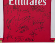ARSENAL: 2006/07 long sleeve 'home' team jersey mounted on plain unfinished display, signed by squad members including Thierry Henry, Robin van Persie, Theo Walcott, Cesc Fabregas, Kolo Toure & William Gallas. On the inside neck is a gold label inscribed - 2