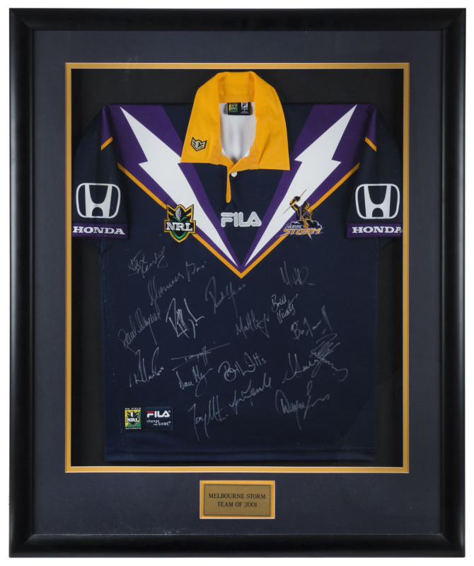 MELBOURNE STORM: Melbourne Storm guernsey signed by 2001 team, with numerous signatures, window mounted, framed & glazed, overall 89x110cm