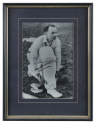 DON BRADMAN: copy of a late 1940s black & white image of Bradman padding up, signed by Bradman in gold pen, framed & glazed, overall 40.5x53cm.