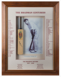 DON BRADMAN: "The Bradman Centuries" window display comprising a signed miniature bat set against a print of Sydney Riley's celebrated portrait photograph