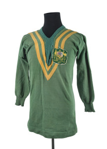 The 1933-34 KANGAROO TOUR OF GREAT BRITAIN: A1933 badged Rugby League Jersey (number removed) believed to have been worn by JIM GIBBS [1909 - 1996]; accompanied by a Christmas greeting card (signed Jim Gibbs) with panoramic photograph of the sixth Austral