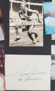 Olympics Autographs: Signed photographs and a first day cover; noted JESSE OWENS, Ian Thorpe, Marjorie Jackson, Alain Minoun, Mark Spitz, Mary-Lou Retton, Nadia Comenechi and Mary Rand. VG condition. (17) - 2