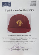 ALLAN BORDER'S QUEENSLAND CRICKET CAP, deep red, embroidered yellow "QCA" monogram on front, "Albion" label inside endorsed "AB" & signed "Allan Border". Fine condition. Attractively framed. [Border represented Queensland in 98 matches between 1980 and 19 - 3