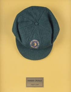 HANSIE CRONJE'S MATCH WORN SOUTH AFRICAN TEST TEAM CAP 1993/94, with U.C.B. South Africa ball and wicket logo on front and "Sacop Brand" label signed in ink "HANSIE CRONJE". Attractively framed.  