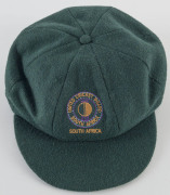 HANSIE CRONJE'S MATCH WORN SOUTH AFRICAN TEST TEAM CAP 1993/94, with U.C.B. South Africa ball and wicket logo on front and "Sacop Brand" label signed in ink "HANSIE CRONJE". Attractively framed.   - 4