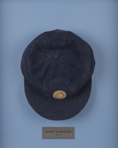 HASHAN TILLAKARATNE'S SRI LANKA TEST CAP, dark blue wool with the Sri Lankan lion emblem embroidered to front; Albion label and signed by Tillakaratne inside. Attractively framed.