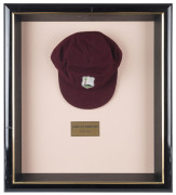 CURTLY AMBROSE'S WEST INDIES TEST TEAM CAP, maroon wool with the West Indies logo embroidered to front. Cap by Bill Edwards of Swansea with Ambrose's name in pen on the label (partly overwritten). Attractively framed. [Ambrose played in 98 Tests for the W - 2
