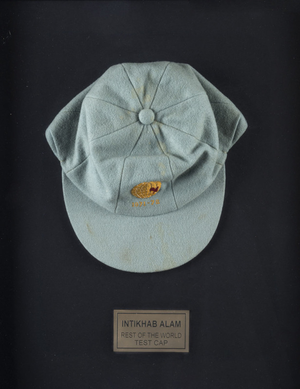 INTIKHAB ALAM'S WORLD XI 1971-72 CAP, pale blue wool, with embroidered logo & "1971-72" on front. Good condition, match used.