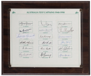 AUSTRALIAN TEST CAPTAINS 1940 - 1990 presentation plaque with the original signatures of 18 Australian Captains including Bill Brown, Don Bradman, Lindsay Hassett, Arthur Morris, Ray Lindwall, Ian Craig, Richie Benaud, and eleven more. With CofA.