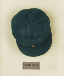 ZAHEER ABBAS' PAKISTAN TEST CAP, green wool with the five-armed star logo of the Pakistan Cricket Board embroidered to front. Made by Naeem Cap Industry, with "Z" in pen on the label and "ZAHEER" in pen on the plastic lining. Very fine condition and attractively framed.