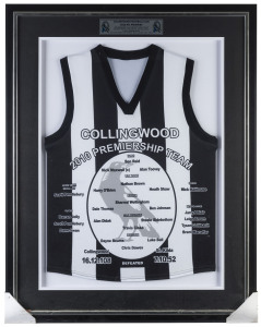 COLLINGWOOD: 2010 AFL PREMIERS souvenir club jumper with the players, the scores and a plaque, all attractively framed and glazed; overall 102 x 79cm.Collingwood defeated St.Kilda by 56 points to win their first premiership since 1990.