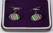 MERV WAITE'S 1938 Australian Team cufflinks; sterling silver and enamel. (2).Accompanied by a letter of provenance fromthe daughter of Ian Ray Curnow, former General Manager of the Glenelg Football Club, to whom Waite presented them. - 2