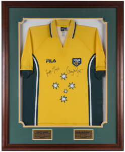 Australian Cricket Shirt by FILA with ACB logo, signed by Geoffrey Marsh and Craig McDermott and attractively framed and glazed together with details of their Test Match and ODI careers. Overall 112 x 91cm.