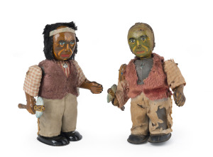 Native American "Brave" wind-up tinplates, made in Japan, two examples, one in largely fine condition the other with with original fabric clothing deteriorating and the hair almost gone, both with brightly coloured facial paintwork, the latter without key; circa 1930s. Height of each 17.5cm (6.75"). Rare survivors.