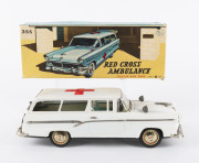 Red Cross Ambulance 355 Ford Japanese tinplate friction toy with siren in original box, circa 1957, 31cm long.