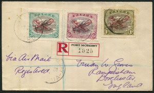 PAPUA - Postal History: 1931 (Jan.17) registered airmail cover to England with Airplane AIR MAIL Overprints 1/-, 6d & 3d tied by PORT MORESBY datestamps, paying 1/6d airmail rate + 3d registration, red/black registration label, on revese SYDNEY & PERTH tr