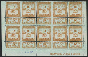 KENYA, UGANDA & TANGANYIKA: (UGANDA) REVENUE: 1962-81 (Barefoot - UNLISTED) 10/- yellowish-brown Commercial Transactions Levy, Imprint block of (10) stamps, all with intact counterfoil tabs and printer's date notation "1-4-81" in lower margin. Superb MUH. Ex De La Rue Archives.