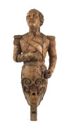 A 19th century ship's masthead figure of Don Francisco Assis de Bourbon, carved wood with remains of painted finish, circa 1850, 135cm high