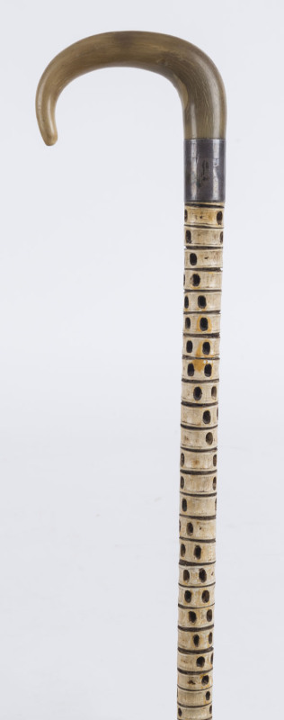 A walking stick, stingray vertebrae with horn handle and silver collar, 19th century, ​87cm high