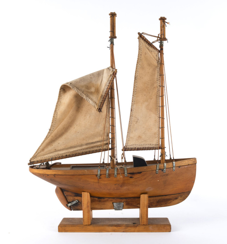 A folk art pond yacht on stand, early 20th century, ​56cm overall