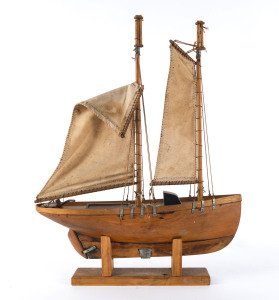 A folk art pond yacht on stand, early 20th century, ​56cm overall