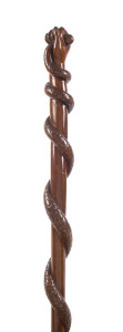 An Australian cedar walking stick, carved fist with entwined serpent, 19th century, 90cm high