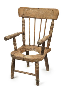 A kangaroo pressed back child's potty chair, kauri pine, circa 1900 56cm high