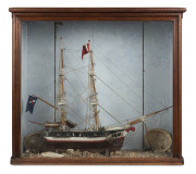 An antique model tallship with two masts in Australian cedar and pine cabinet, signed "C.W. 1879" on the top, 76cm high, 84cm wide, 31cm deep