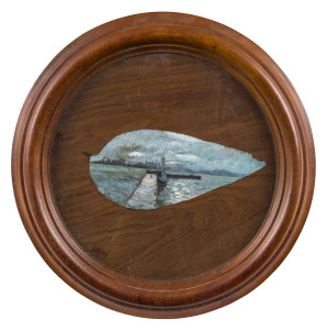 An Australian hand-painted gumleaf in original circular cedar frame, late 19th century, signed lower centre "G.C.", 30cm diameter