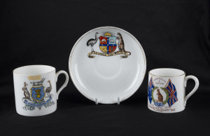 Australian souvenir porcelain saucer and two teacups, early 20th century, (3 items), the saucer 14cm diameter
