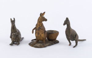 A gilt metal kangaroo inkpot, a cast bronze kangaroo and a cast brass kangaroo, late 19th and early 20th century, (3 items). the tallest 11cm high