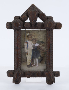 An Australian tramp art picture frame, cigar box cedar and pine, late 19th early 20th century, 25 x 17cm