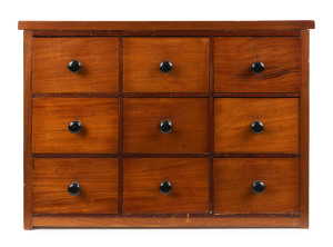 An Australian miniature chest of 9 drawers, cedar and pine, late 19th century, 46cm high, 65.5cm wide, 24cm deep