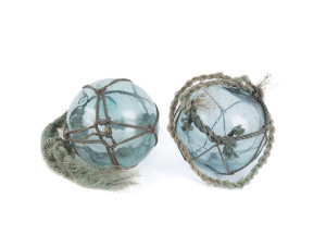 Two glass fishing buoys, 20th century, 29cm diameter