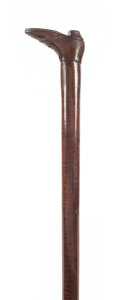 An Australian walking stick, fiddleback blackwood shaft with carved cedar boot handle, 19th century, ​91.5cm high