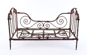 A salesman's sample antique cast iron daybed, 19th century, 36cm high, 57cm wide, 27cm deep