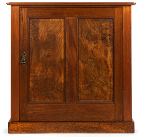 An Australian Colonial single door cupboard, kauri pine with burl cedar panel door, Northern New South Wales, 19th century, 91cm high, 91cm wide, 45cm deep