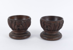 A pair of Colonial wooden bowls, turned and carved blackwood with acanthus motif, Tasmanian origin, mid 19th century, 12cm high, 14cm diameter