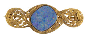 A yellow gold and opal brooch, late 19th century, ​5.25cm long, 7 grams