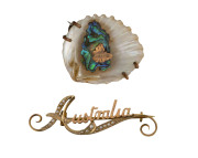 Tasmania brooch, rose gold, paua shell and seashell, late 19th century, together with a 9ct gold and seed pearl "Australia" brooch, 2.8 grams, late 19th century, (2 items). 3cm wide