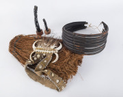 Papua New Guinea grass skirt, necklace, waist band and two tribal statues, 20th century, the taller statue 25cm high