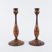 A pair of Australian pokerwork candlesticks, circa 1920s, 31.5cm high