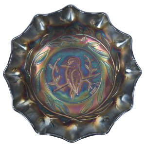 Amethyst carnival glass "Kingfisher" fruit bowl, circa 1920s, 7cm high, 24.5cm diameter